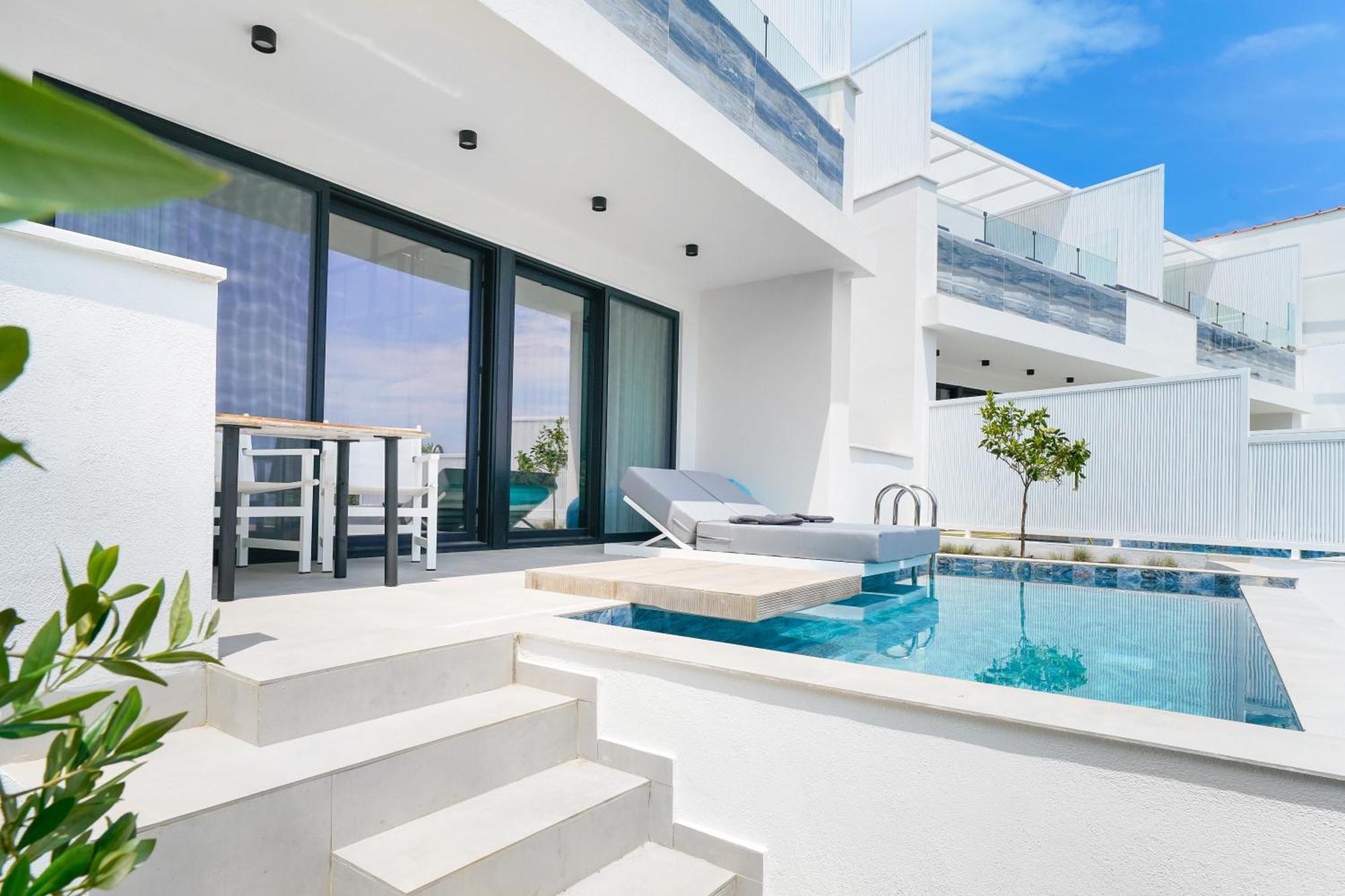 Mythodea Prive Luxury Suites Chrysi Ammoudia Exterior foto