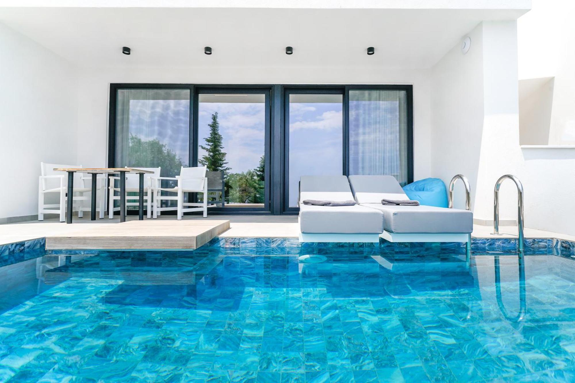 Mythodea Prive Luxury Suites Chrysi Ammoudia Exterior foto